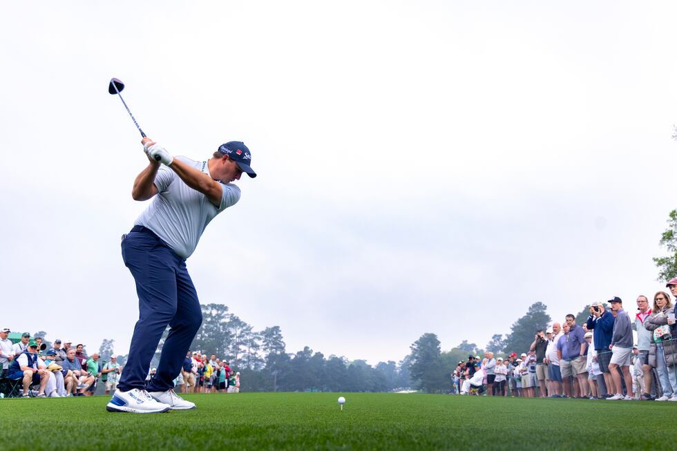 Sepp Straka of Austria plays a stroke from the No. 1 tee during practice round 2 at Augusta...