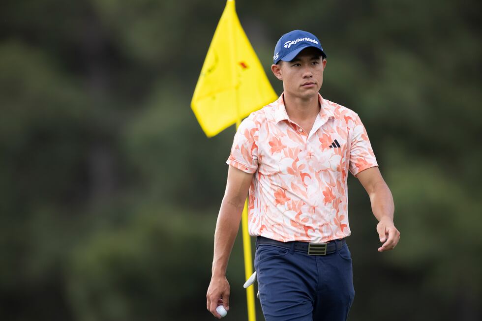 Collin Morikawa of the United States walks on the No. 17 green during the first round of the...
