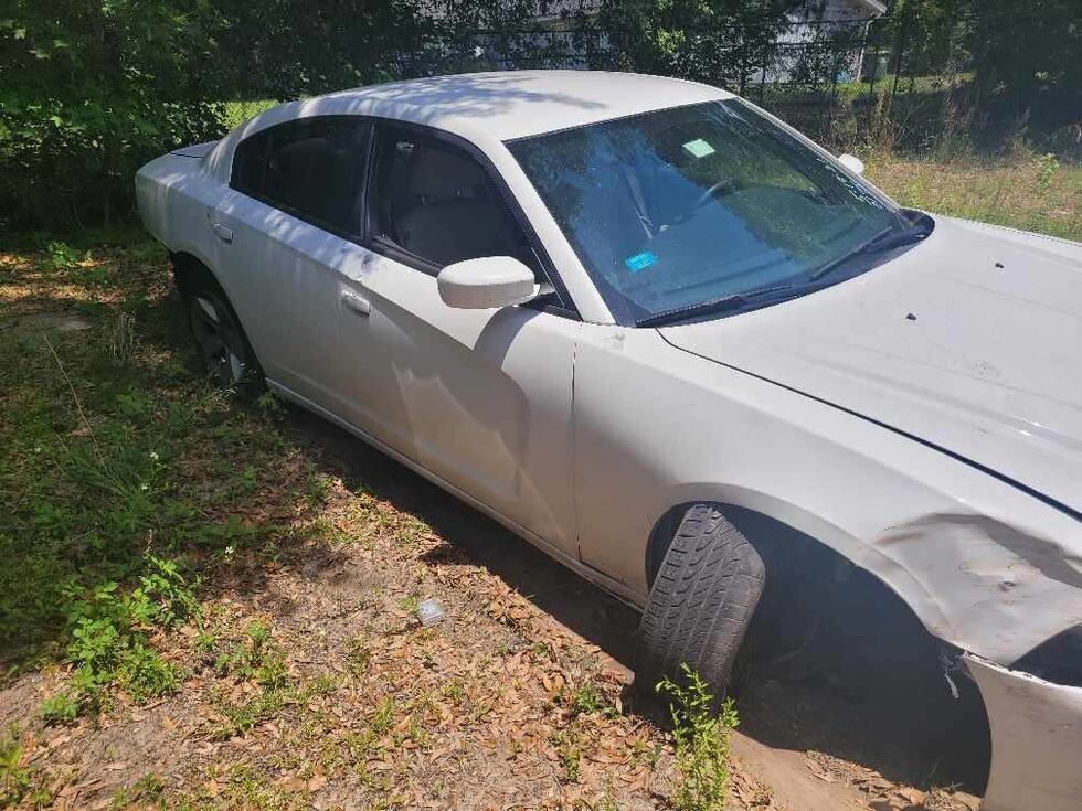 Carjacked car found totaled