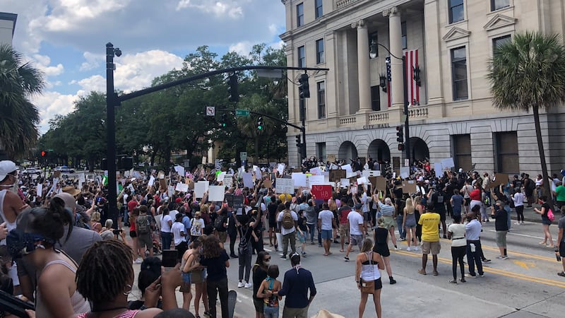Protesters in front of Savannah City Hall chanting "I cant breath."
