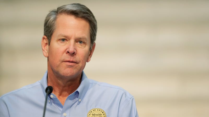 Georgia Gov. Brian Kemp speaks about the COVID-19 virus during a news conference at the...