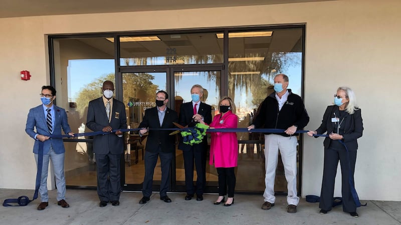 Liberty Regional Medical Center and St. Joseph's/Candler leaders cut the ribbon on their brand...