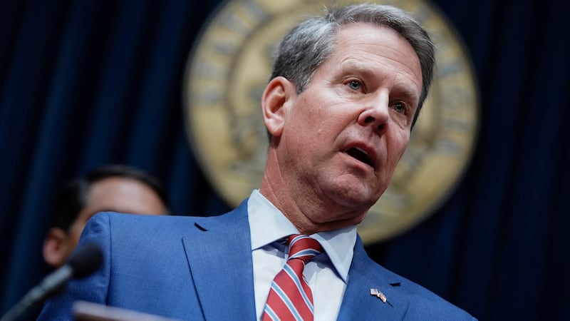 In this Dec. 4, 2019, file photo, Georgia Gov. Brian Kemp takes questions from the media at...