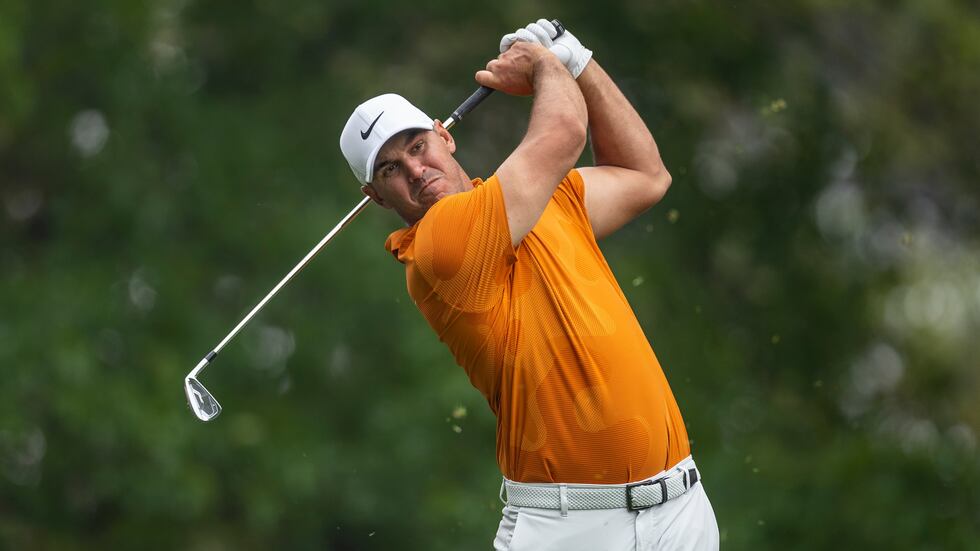 Brooks Koepka of the United States plays a stroke from the No. 4 fairway during practice round...