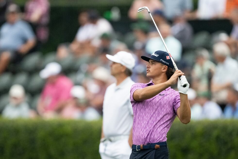 Amateur Harrison Crowe of Australia warms up at the Tournament Practice Area during the first...