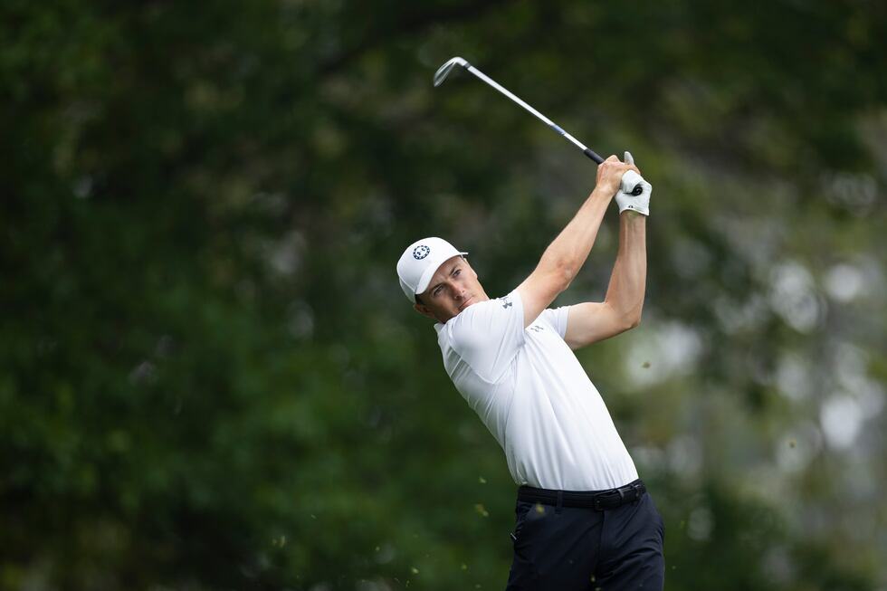 Masters champion Jordan Spieth plays a stroke from the No. 4 tee during practice round 2 at...