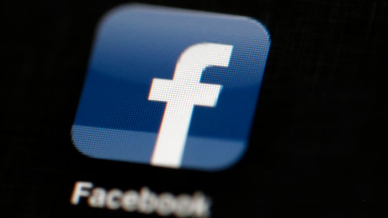 FILE - In this May 16, 2012, file photo, the Facebook logo is displayed on an iPad in...