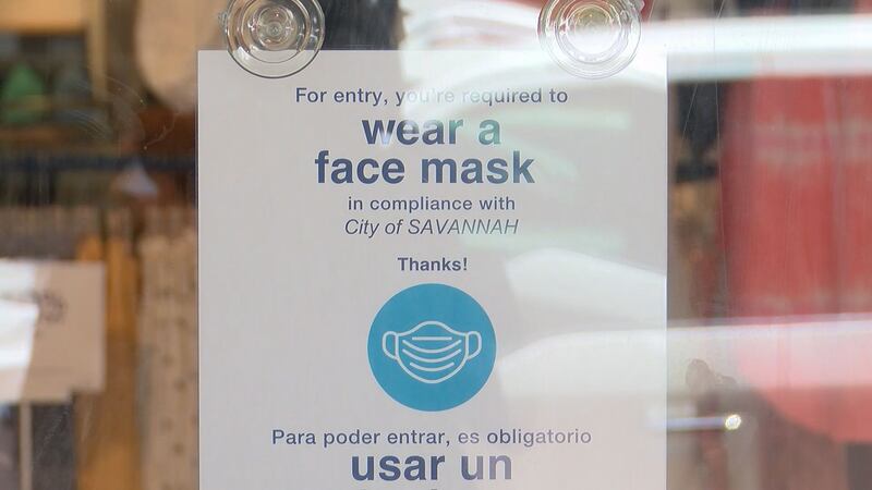 A sign telling customers to wear a mask in compliance with the new ordinance in Savannah.